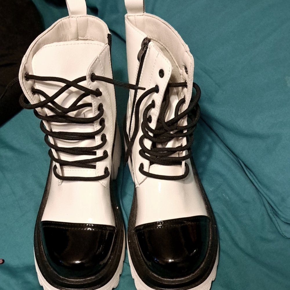 Size 8.5 black and white boots